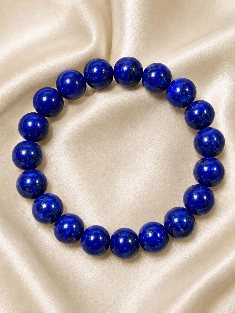 Deep blue lapis lazuli bead bracelet on champagne silk